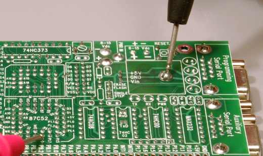 photo: multimeters leads on RxD pin and ground